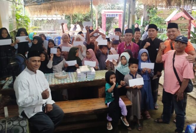 
					Tim Yayasan Bhakti Insani Cabang Lombok bersama anak-anak yatim piatu di Kekait Puncang, Minggu 6 September 2026. (Foto: Panji)